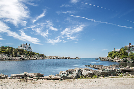 Mansions on the hills surround one of Newport's beaches'